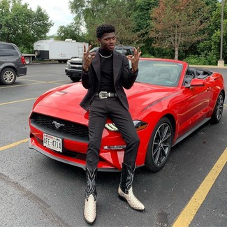 Lil Nas X wearing Black and White Leather Cowboy Boots, Black Chinos, Black Turtleneck, Black Double Breasted Blazer