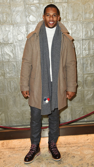 Victor Cruz wearing Dark Brown Leather Casual Boots, Charcoal Wool Chinos, White Turtleneck, Camel Duffle Coat