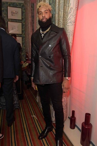 Odell Beckham Jr. wearing Black Leather Chelsea Boots, Black Chinos, Black Turtleneck, Black Leather Pea Coat