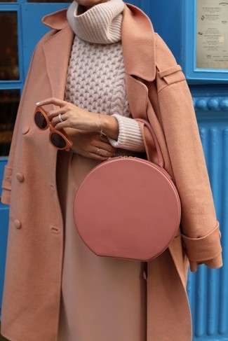 Camel Coat Outfits For Women: As you can see here, looking stylish doesn't take that much work. Just rock a camel coat with a tan midi skirt and you'll look incredibly stylish.