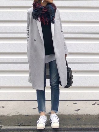 Red and Navy Plaid Scarf Outfits For Women: Wear a grey coat and a red and navy plaid scarf to create an incredibly stylish and modern-looking casual ensemble. Look at how great this ensemble is completed with white leather low top sneakers.