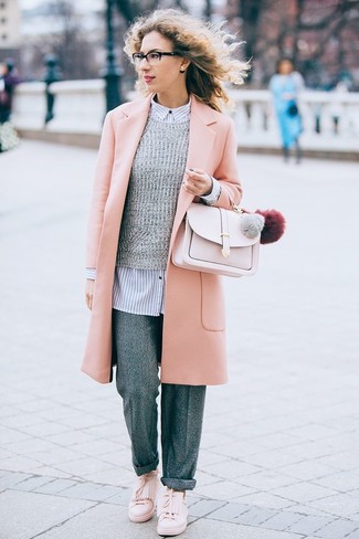 Tan Leather Satchel Bag Outfits: A pink coat and a tan leather satchel bag married together are a total eye candy for those who prefer cool chic looks. Pink leather slip-on sneakers are a never-failing footwear option here that's full of character.