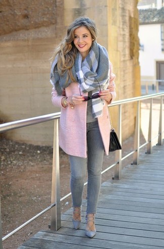 Hot Pink Coat Outfits For Women: Marry a hot pink coat with grey skinny jeans for a cool and fashionable look. If you're puzzled as to how to finish off, introduce grey suede pumps to the mix.
