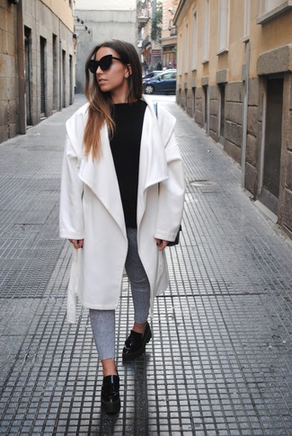 Black Leather Platform Loafers Outfits: This combo of a white coat and grey skinny jeans speaks casual cool and effortless style. The whole ensemble comes together if you throw in a pair of black leather platform loafers.