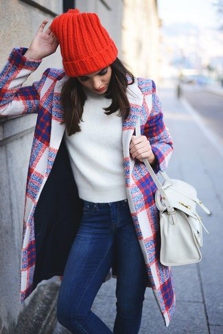 You'll be surprised at how easy it is to get dressed like this. Just a white plaid coat worn with navy skinny jeans.