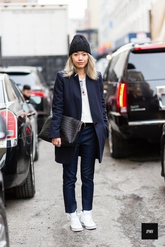 Navy Skinny Pants Outfits: Display your styling prowess by wearing a navy coat and navy skinny pants. For times when this ensemble is just too much, play it down by rounding off with white high top sneakers.