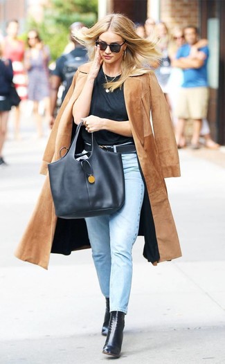 Consider pairing a camel coat with light blue jeans to parade your styling prowess. Add a pair of black leather ankle boots to your look and you're all done and looking stunning.