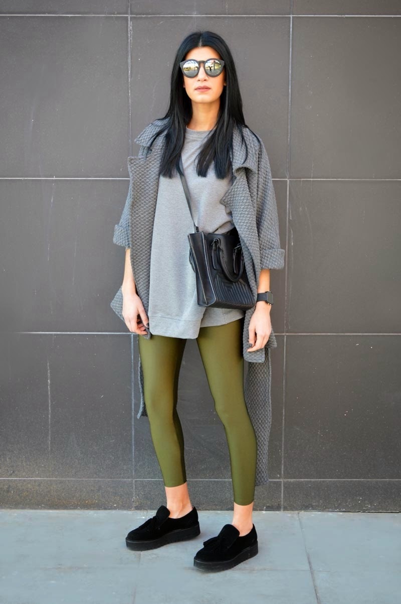 Outfit is the day is a pair of olive green leggings, black and