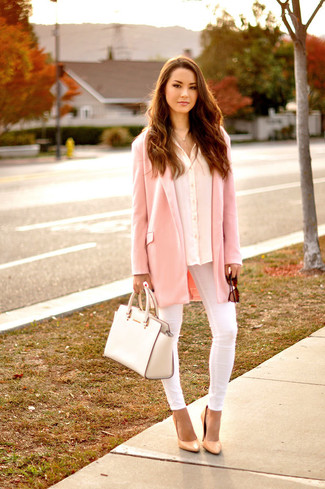 White Jeans Outfits For Women: This pairing of a pink coat and white jeans embodies versatility and casual style. Tan leather pumps are a smart pick to complement your outfit.