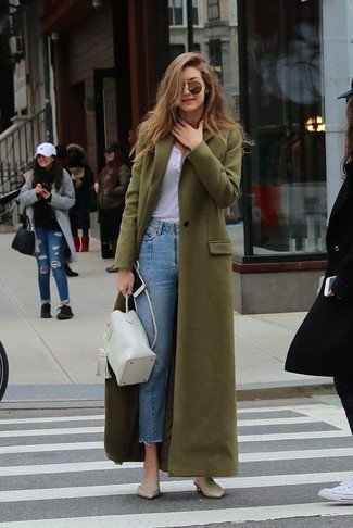 Olive Coat Outfits For Women: If it's ease and practicality that you appreciate in a look, wear an olive coat with light blue jeans. To give your overall ensemble a sleeker finish, why not introduce beige leather mules to your look?