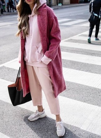 Athletic Shoes Outfits For Women: A red coat and pink culottes teamed together are a total eye candy for fashionistas who prefer ultra-cool styles. Introduce athletic shoes to the equation to inject a touch of casualness into your ensemble.