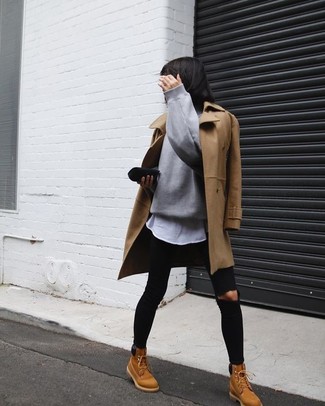 Camel Coat Outfits For Women: Extremely chic, this combination of a camel coat and black ripped skinny jeans provides with variety. Spice up this ensemble by slipping into a pair of tan nubuck lace-up flat boots.