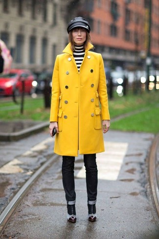Black Cap Outfits For Women: Want to inject your wardrobe with some fashion-forward style? Pair a yellow coat with a black cap. And if you wish to immediately dress up your ensemble with a pair of shoes, complete this look with multi colored leather ankle boots.