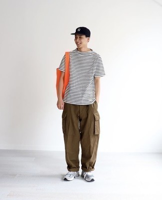Men's White and Black Horizontal Striped Crew-neck Sweater, Brown Cargo Pants, Grey Athletic Shoes, Orange Canvas Tote Bag