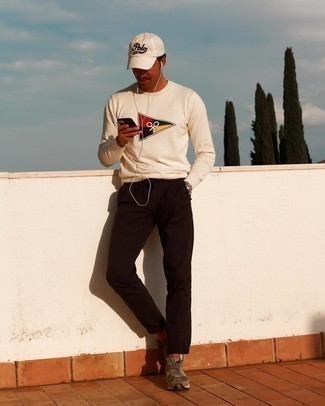 White Baseball Cap Outfits For Men: A white print crew-neck sweater and a white baseball cap are absolute menswear staples that will integrate brilliantly within your casual repertoire. Finishing off with brown athletic shoes is a fail-safe way to add some extra flair to this getup.