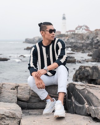 Men's Black and White Vertical Striped Crew-neck Sweater, White Chinos, White Athletic Shoes, Black Sunglasses