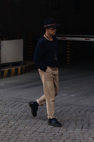 Navy Wool Hat Outfits For Men: If you're all about feeling relaxed when it comes to styling, this combination of a navy crew-neck sweater and a navy wool hat is what you need. Add black leather derby shoes to the mix for an added touch of style.