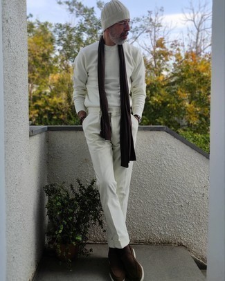 White Corduroy Chinos Outfits: A white crew-neck sweater and white corduroy chinos are the ideal way to infuse some cool into your day-to-day off-duty arsenal. Dark brown suede loafers will bring an elegant twist to your ensemble.