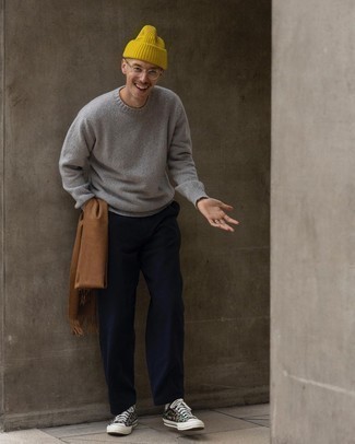 Mustard Beanie Outfits For Men: For a relaxed look, try pairing a grey crew-neck sweater with a mustard beanie — these two pieces play pretty good together. And if you want to easily perk up your ensemble with a pair of shoes, round off with olive print canvas low top sneakers.