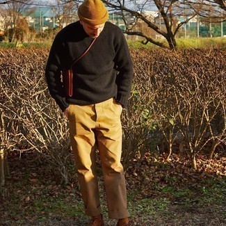 Tobacco Beanie Outfits For Men: This look with a black crew-neck sweater and a tobacco beanie isn't so hard to pull off and is easy to adapt according to circumstances. A good pair of brown leather oxford shoes is a simple way to bring an added touch of style to your look.
