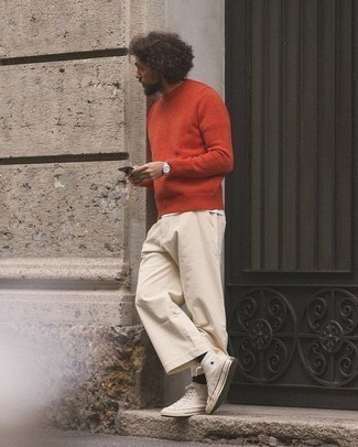 Beige Chinos Spring Outfits: A red crew-neck sweater and beige chinos worn together are a perfect match. Bring a modern twist to an otherwise traditional ensemble by sporting a pair of beige canvas high top sneakers. So so as you can see, it's a killer, not to mention spring-friendly, outfit to have in your transeasonal sartorial arsenal.