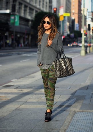 Grey Crew-neck Sweater Outfits For Women: For a look that provides practicality and fashion, wear a grey crew-neck sweater and olive camouflage jeans. Rev up your outfit by wearing a pair of black suede mules.