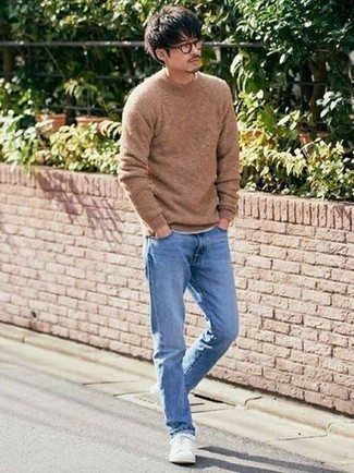 Tobacco Crew-neck Sweater Outfits For Men: Teaming a tobacco crew-neck sweater with light blue jeans is an amazing choice for a casual and cool outfit. Our favorite of a ton of ways to complete this outfit is with a pair of white leather low top sneakers.