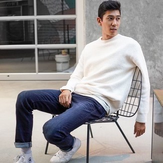 Grey Horizontal Striped Crew-neck T-shirt Outfits For Men: This combo of a grey horizontal striped crew-neck t-shirt and navy jeans is hard proof that a safe casual outfit can still look really interesting. Now all you need is a pair of white canvas high top sneakers.