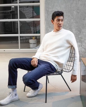 Grey Horizontal Striped Crew-neck T-shirt Outfits For Men: For an ensemble that offers function and fashion, consider pairing a grey horizontal striped crew-neck t-shirt with navy jeans. White canvas high top sneakers integrate really well within a ton of looks.