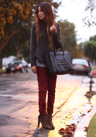 Swing into something functional yet modern with a charcoal crew-neck sweater and burgundy jeans. A chic pair of brown leopard ankle boots is a simple way to add a sense of refinement to this ensemble.