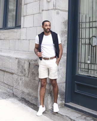 Black Crew-neck Sweater Outfits For Men: You'll be surprised at how easy it is for any gent to throw together this relaxed getup. Just a black crew-neck sweater combined with white shorts. Our favorite of a ton of ways to finish off this outfit is a pair of white low top sneakers.