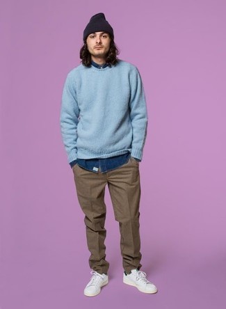 Light Blue Crew-neck Sweater Outfits For Men: To pull together a casual outfit with a fashionable spin, you can rock a light blue crew-neck sweater and brown chinos. Dial down your ensemble with a pair of white and green leather low top sneakers.