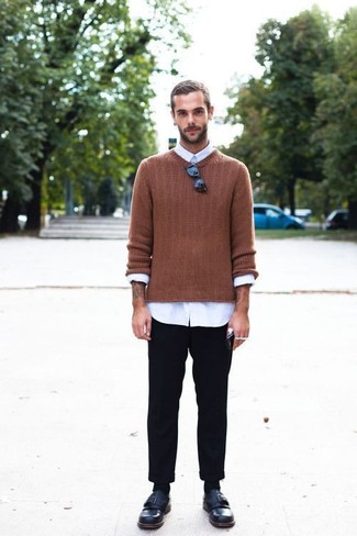 Tobacco Crew-neck Sweater Outfits For Men: Effortlessly blurring the line between dapper and laid-back, this combo of a tobacco crew-neck sweater and black chinos is likely to become one of your favorites. Go the extra mile and spice up your outfit by rocking a pair of black leather monks.