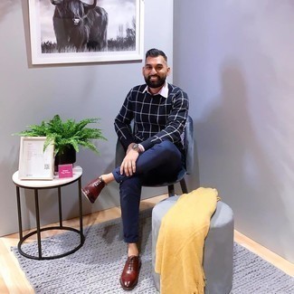 Blue Check Crew-neck Sweater Outfits For Men: A blue check crew-neck sweater and navy chinos are a savvy ensemble to take you throughout the day and into the night. Clueless about how to complement this outfit? Finish off with a pair of burgundy leather oxford shoes to lift it up.