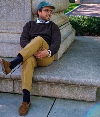 Dark Brown Crew-neck Sweater Outfits For Men: You'll be surprised at how easy it is to get dressed like this. Just a dark brown crew-neck sweater combined with khaki dress pants. Introduce brown suede loafers to the equation et voila, your ensemble is complete.