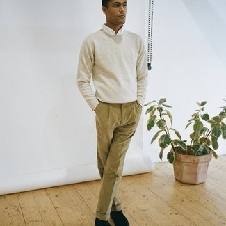 Beige Crew-neck Sweater Spring Outfits For Men: This is solid proof that a beige crew-neck sweater and khaki corduroy dress pants are amazing when married together in a polished getup for today's gent. When it comes to shoes, complement your look with a pair of black suede loafers. If you're scouting for an easy-to-transition outfit, this is it.