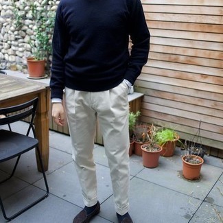Navy Crew-neck Sweater Dressy Outfits For Men: Marrying a navy crew-neck sweater with white dress pants is a nice pick for a smart and polished ensemble. The whole look comes together perfectly when you opt for a pair of dark brown suede loafers.