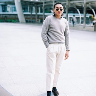 White Linen Dress Pants Outfits For Men: A grey crew-neck sweater and white linen dress pants are a nice pairing that will get you a great deal of attention. For extra style points, add a pair of dark brown suede loafers to the mix.