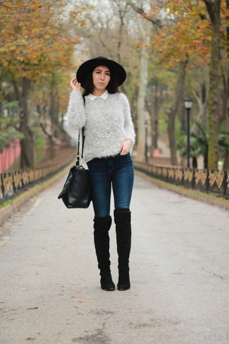 Navy Skinny Jeans Outfits: This combo of a grey fluffy crew-neck sweater and navy skinny jeans is ideal when you want to go about your day with confidence in your outfit. Give a different twist to an otherwise standard outfit by sporting black suede over the knee boots.