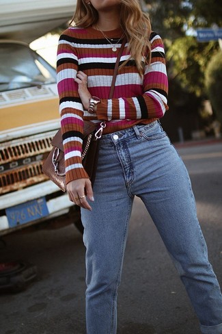 Brown Leather Crossbody Bag Outfits: For an edgy and casual outfit, choose a multi colored horizontal striped crew-neck sweater and a brown leather crossbody bag — these items play perfectly well together.
