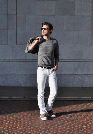 Grey Suede Low Top Sneakers Outfits For Men: This laid-back pairing of a grey crew-neck sweater and white jeans is perfect when you need to feel confident in your look. If you're not sure how to finish off, add a pair of grey suede low top sneakers to the mix.