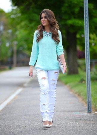 Grey Leather Pumps Outfits: This pairing of a mint crew-neck sweater and white ripped jeans is very easy to do and so comfortable to work over the course of the day as well! Balance out your ensemble with a sleeker kind of footwear, such as these grey leather pumps.