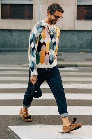 Tan Canvas Tassel Loafers Outfits: Go for a multi colored crew-neck sweater and navy jeans to assemble an interesting and modern-looking off-duty outfit. Power up this ensemble with a pair of tan canvas tassel loafers.