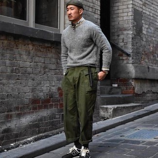 Olive Beanie Outfits For Men: Marrying a grey crew-neck sweater and an olive beanie will hallmark your prowess in men's fashion even on dress-down days. Our favorite of a variety of ways to complement this outfit is black and white athletic shoes.