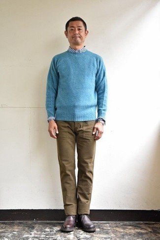 Light Blue Crew-neck Sweater Outfits For Men: For a look that's pared-down but can be worn in many different ways, wear a light blue crew-neck sweater and brown chinos. Add a pair of burgundy leather desert boots to the equation and you're all done and looking incredible.