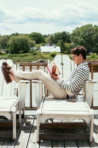 Brown Leather Boat Shoes Outfits: This combination of a white and navy horizontal striped crew-neck sweater and khaki chinos will allow you to display your skills in men's fashion even on lazy days. The whole outfit comes together quite nicely if you introduce a pair of brown leather boat shoes to this getup.
