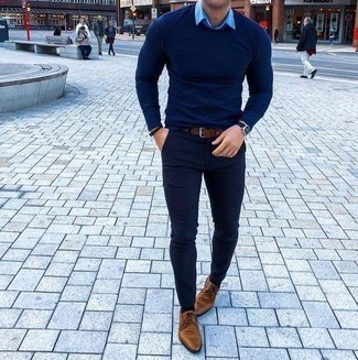Tan Leather Derby Shoes Outfits: A navy crew-neck sweater and navy chinos married together are a perfect match. Finish off your ensemble with tan leather derby shoes to switch things up.
