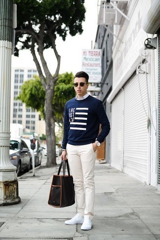 Blue Print Crew-neck Sweater Outfits For Men: A blue print crew-neck sweater and white chinos are an easy way to introduce some cool into your daily outfit choices. White canvas low top sneakers are a savvy pick to complete this look.