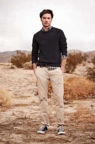 Dark Brown Suede Belt Outfits For Men: Why not team a black crew-neck sweater with a dark brown suede belt? As well as very functional, both items look awesome when worn together. For a more polished take, why not add black and white canvas low top sneakers to the equation?
