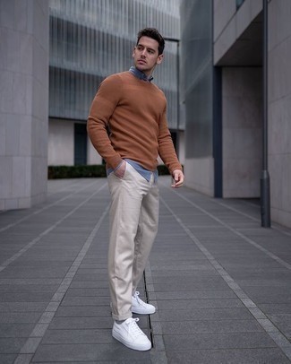 Beige Crew-neck Sweater Spring Outfits For Men: Consider teaming a beige crew-neck sweater with beige chinos to feel fully confident and look casual and cool. If you want to easily dress down this look with footwear, complete this outfit with white canvas low top sneakers. Springtime calls for neat getups just like this one.